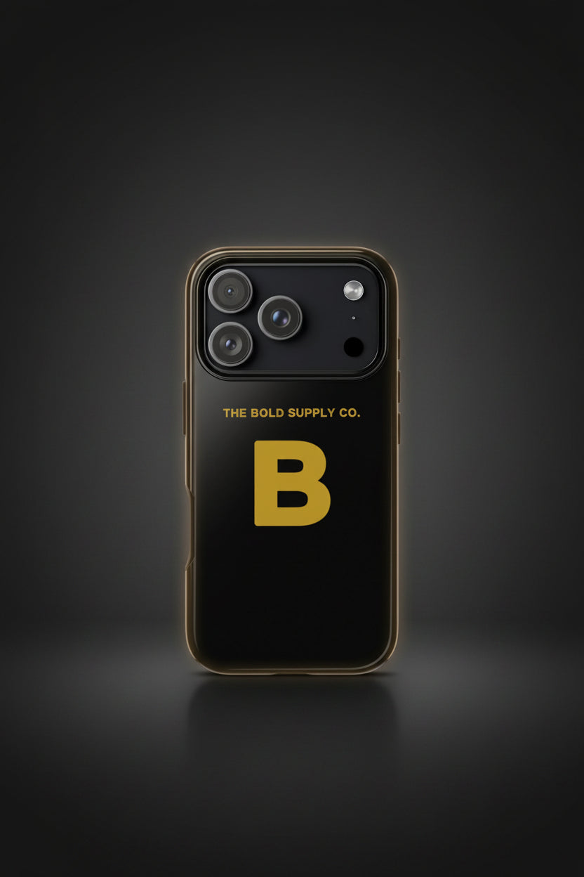 Black phone case with 'The Bold Supply Co.' branding and a large yellow 'B'.