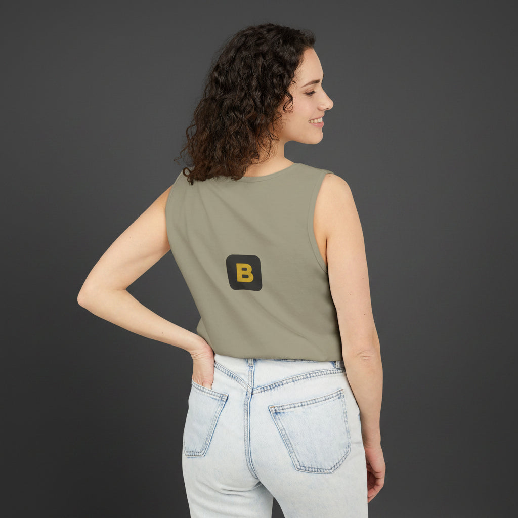 Woman wearing a sleeveless green top with a logo on a white background