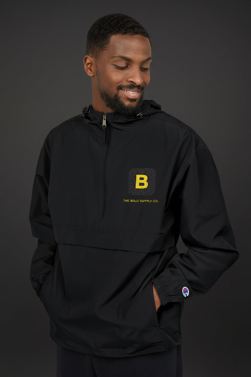 Man wearing a black pullover with text on a white background