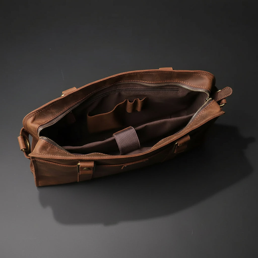 Brown leather bag on a white background