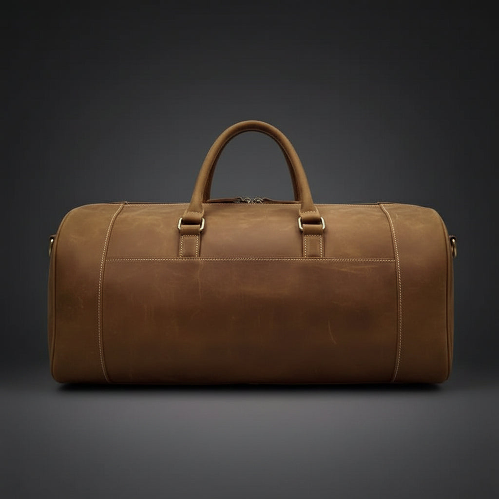 Brown leather duffel bag on a white background
